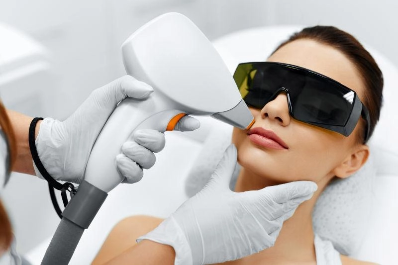 women lying in bed for hair removal