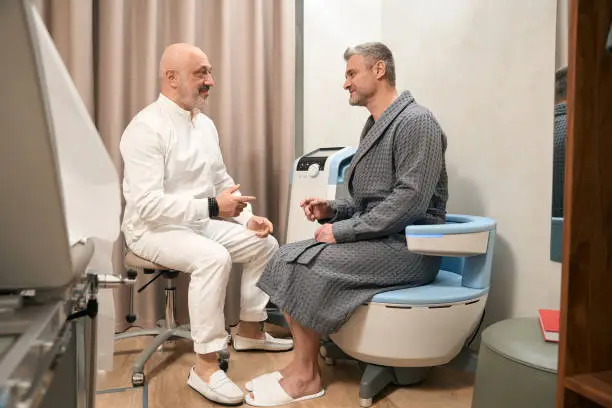 man communicating with doctor